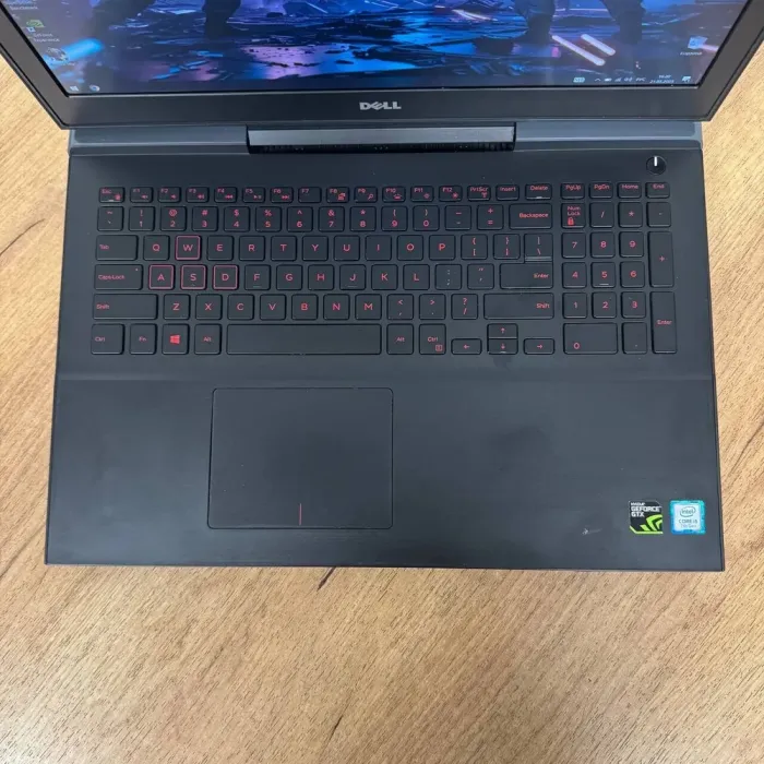Ігровий ноутбук Б-класу Dell Inspiron 15 Gaming 7567 / 15.6" (1920x1080) IPS / Intel Core i5-7300HQ (4 ядра по 2,5 - 3,5 ГГц) / 16 ГБ DDR4 / 128 ГБ SSD M.2 + 1000 ГБ HDD / nVidia GeForce GTX 1050, 4 ГБ GDDR5, 128-bit / WebCam б/в - зображення 7