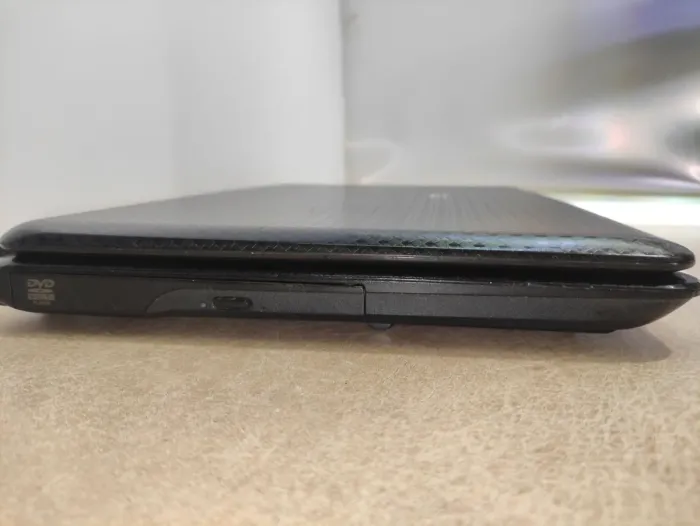 Ноутбук Asus K50C / 15.6" (1366x768) TN / Intel Celeron 220 (1 ядро по 1.2 GHz) / 4 GB DDR2 / 120 GB SSD / SIS Mirage 3 Graphics / WebCam / АКБ не тримає б/в - зображення 4