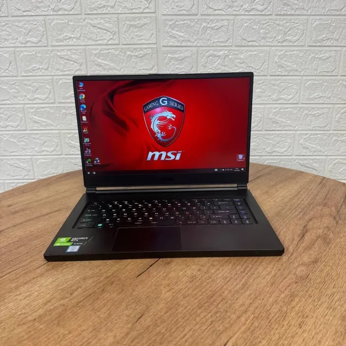Ігровий ноутбук Б-клас MSI GS65 8RF Stealth Thin / 15.6" (1920x1080) IPS / Intel Core i7-8750H (6 (12) ядер по 2.2 - 4.1 GHz) / 32 GB DDR4 / 512 GB SSD / nVidia GeForce GTX 1070 Max-Q, 8 GB GDDR5, 256-bit / WebCam б/в - зображення 2
