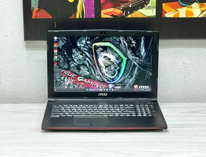 Ігровий ноутбук MSI GP62 / 15.6" (1920x1080) TN / Intel Core i7-7700HQ (4 (8) ядра по 2.8 - 3.8 GHz) / 16 GB DDR4 / 128 GB SSD M.2 + 1000 GB HDD / nVidia GeForce GTX 1060, 3 GB GDDR5, 192-bit / WebCam / Win 11 б/в - зображення 2
