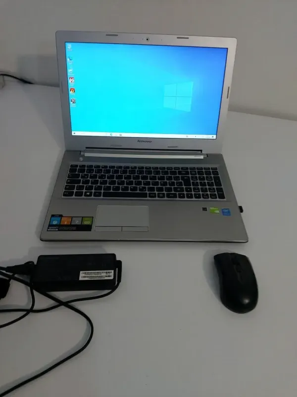 Ноутбук Б-клас Lenovo Z50-70 / 15.6" (1920x1080) TN / Intel Core i5-4210U (2 (4) ядра по 1.7 - 2.7 GHz) / 8 GB DDR3 / 256 GB SSD / nVidia GeForce GT 840M, 2 GB DDR3, 64-bit / WebCam / DVD-ROM б/в - зображення 2