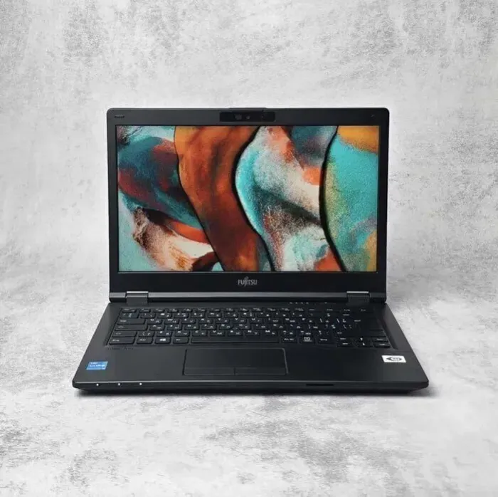 Ноутбук Fujitsu LifeBook E5411 / 14" (1920x1080) IPS / Intel Core i3-1115G4 (2 (4) ядра по 1.7 - 4.1 GHz) / 16 GB DDR4 / 256 GB SSD M.2 / Intel UHD Graphics / WebCam / Win 10 Pro б/в - зображення 2