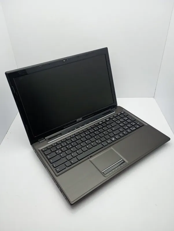 Ноутбук MSI CX61 / 15.6" (1366x768) TN / Intel Core i3-4000M (2 (4) ядра по 2.4 GHz) / 6 GB DDR3 / 500 GB HDD / Intel HD Graphic 4600 / WebCam б/в - зображення 6