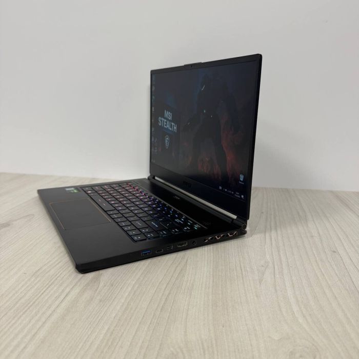 Ігровий ноутбук Б-клас MSI GS65 Stealth 9SE / 15.6" (1920x1080) IPS / Intel Core i7-9750H (6 (12) ядер по 2.6 - 4.5 GHz) / 16 GB DDR4 / 512 GB SSD NVMe / nVidia GeForce RTX 2060, 6 GB GDDR6, 192-bit / WebCam б/в - зображення 5