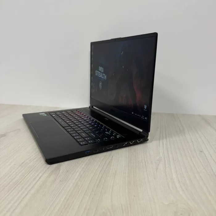 Ігровий ноутбук Б-клас MSI GS65 Stealth 9SE / 15.6" (1920x1080) IPS / Intel Core i7-9750H (6 (12) ядер по 2.6 - 4.5 GHz) / 16 GB DDR4 / 512 GB SSD NVMe / nVidia GeForce RTX 2060, 6 GB GDDR6, 192-bit / WebCam б/в - зображення 5