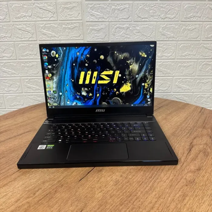 Ігровий ноутбук Б-клас MSI GS66 Stealth 10SE / 15.6" (1920x1080) IPS / Intel Core i7-10750H (6 (12) ядер по 2.6 - 5.0 GHz) / 16 GB DDR4 / 512 GB SSD / nVidia GeForce RTX 2060, 6 GB GDDR6, 192-bit / WebCam б/в - зображення 2