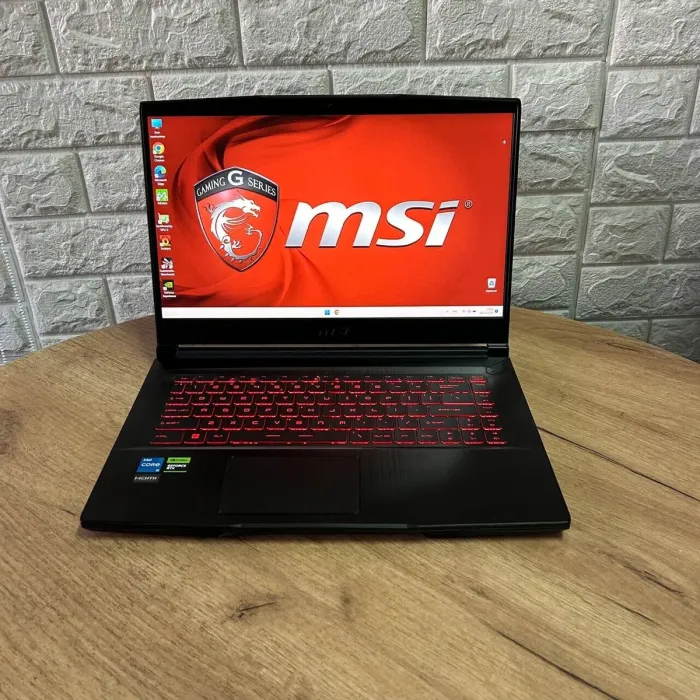 Ігровий ноутбук MSI GF63 Thin 11UC / 15.6" (1920x1080) IPS / Intel Core i5-11400H (6 (12) ядер по 2.7 - 4.5 GHz) / 16 GB DDR4 / 512 GB SSD / nVidia GeForce RTX 3050, 4 GB GDDR6, 128-bit / WebCam б/в - зображення 2