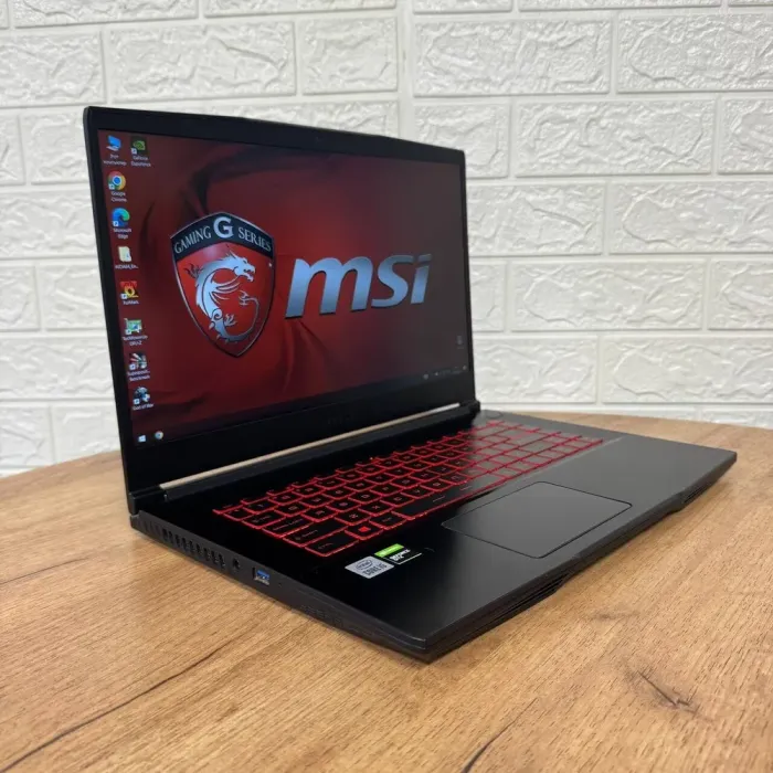 Ігровий ноутбук MSI GF63 Thin 10SC / 15.6" (1920x1080) IPS / Intel Core i5-10500H (6 (12) ядер по 2.5 - 4.5 GHz) / 16 GB DDR4 / 128 GB SSD NVMe + 1000 GB HDD / nVidia GeForce GTX 1650 Max-Q, 4 GB GDDR6, 128-bit / WebCam б/в - зображення 4
