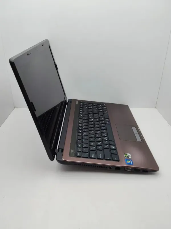 Ноутбук Asus K53S / 15.6" (1366x768) TN / Intel Core i5-2410M (2 (4) ядра по 2.3 - 2.9 GHz) / 6 GB DDR3 / 320 GB HDD / nVidia GeForce 610M, 2 GB GDDR3, 64-bit / WebCam / Посилена АКБ б/в - зображення 6