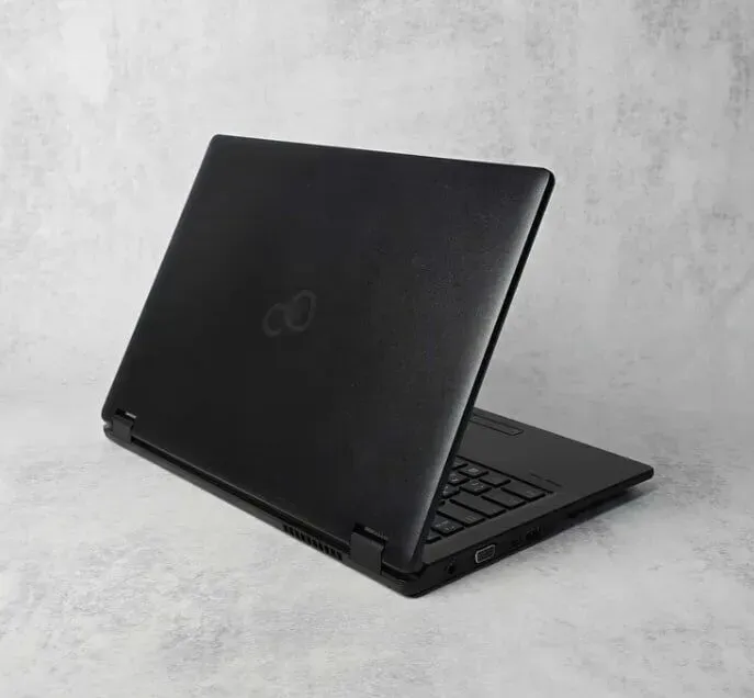 Ноутбук Fujitsu LifeBook E449 / 14" (1920x1080) IPS / Intel Core i3-8130U (2 (4) ядра по 2.2 - 3.4 GHz) / 8 GB DDR4 / 256 GB SSD M.2 / Intel UHD Graphics 620 / WebCam / Win 10 Pro б/в - зображення 3