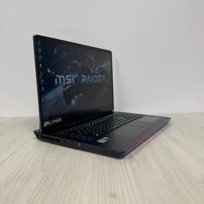Ігровий ноутбук MSI GE76 Raider 10UG / 17.3" (1920x1080) IPS / Intel Core i7-10870H (8 (16) ядер по 2.2 - 5.0 GHz) / 32 GB DDR4 / 1000 GB SSD NVMe / nVidia GeForce RTX 3070, 8 GB GDDR6, 256-bit / WebCam б/в - зображення 4