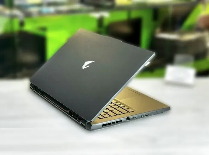 Ігровий ноутбук Б-клас Gigabyte Aorus 7 9MF / 17.3" (1920x1080) IPS / Intel Core i5-12500H (12 (16) ядер по 3.3 - 4.5 GHz) / 16 GB DDR4 / 512 GB SSD M.2 / nVidia GeForce RTX 4050, 6 GB GDDR6, 96-bit / WebCam / Win 11 Pro б/в - зображення 5
