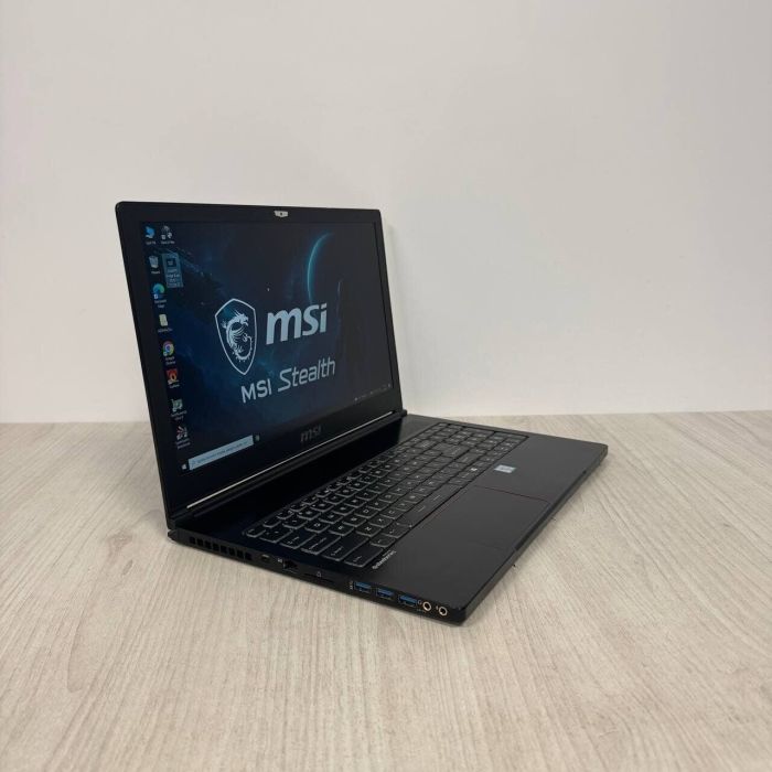 Ігровий ноутбук Б-класу MSI GS63VR Stealth 6RF / 15.6" (1920x1080) IPS / Intel Core i7-6700HQ (4 (8) ядра по 2.6 - 3.5 GHz) / 16 GB DDR4 / 512 GB SSD / nVidia GeForce GTX 1060, 6 GB GDDR5, 192-bit / WebCam б/в - изображение 4