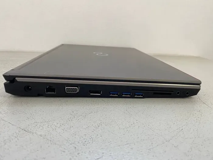 Мобільна робоча станція Fujitsu Celsius H730 / 15.6" (1920x1080) IPS / Intel Core i7-4800MQ (4 (8) ядра по 2.7 - 3.7 GHz) / 32 GB DDR3 / 256 GB SSD / nVidia Quadro K1100M, 2 GB GDDR5, 128-bit / WebCam / DVD-ROM б/в - зображення 3