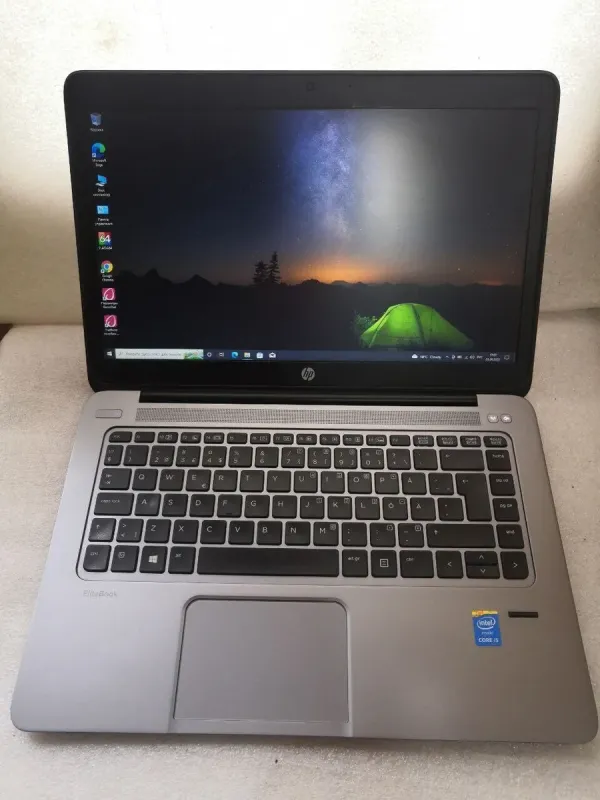Ноутбук Б-клас HP EliteBook Folio 1040 G2 / 14" (1600x900) TN / Intel Core i5-5200U (2 (4) ядра по 2.2-2.7 GHz) / 8 GB DDR3 / 180 GB SSD / HD Graphics 5500 / Win 10 Pro б/в - зображення 2