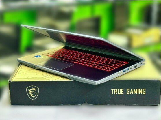 Ігровий ноутбук MSI GF63 Thin / 15.6" (1920x1080) IPS / Intel Core i5-12450H (8 (12) ядер по 3.3 - 4.4 GHz) / 16 GB DDR4 / 512 GB SSD M.2 + 1000 GB HDD / nVidia GeForce RTX 4050, 6 GB GDDR6, 96-bit / WebCam / Win 11 Home б/в - зображення 7