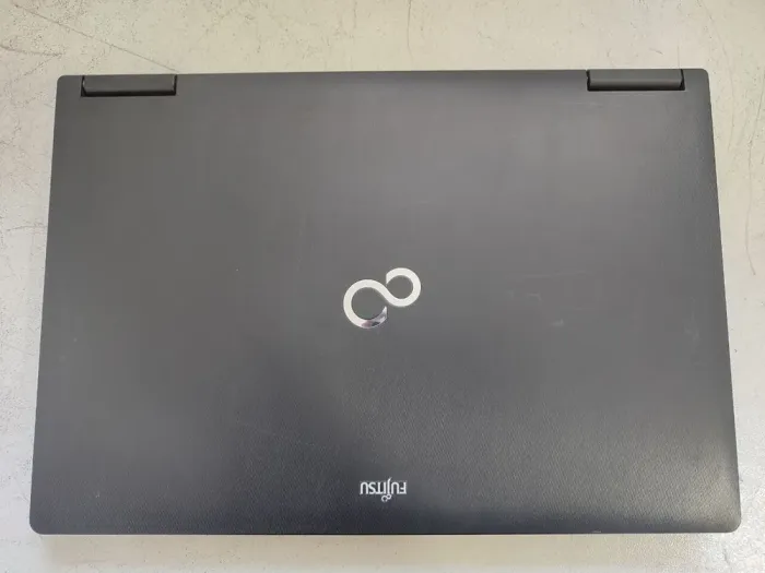 Мобільна робоча станція Fujitsu Celsius H920 / 17.3" (1920x1080) TN / Intel Core i7-3820QM (4 (8) ядра по 2.7 - 3.7 GHz) / 32 GB DDR3 / 240 GB SSD / nVidia Quadro K3000M, 2 GB GDDR5, 256-bit / WebCam б/в - зображення 7