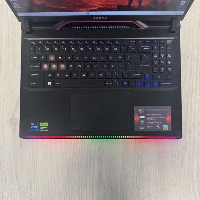 Ігровий ноутбук Б-класу MSI Raider GE68 HX 14VGG / 16" (1920×1200) IPS / Intel Core i9-14900HX (24 (32) ядра по 2,2 - 5,7 ГГц) / 32 ГБ DDR5 / 1000 ГБ SSD NVMe / nVidia GeForce RTX 4070, 8 ГБ GDDR6, 128-біт / Веб-камера б/в - зображення 3