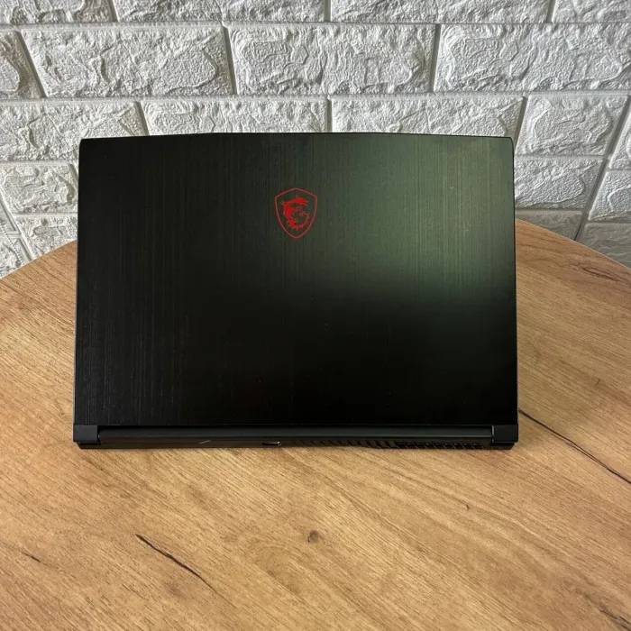 Ігровий ноутбук MSI GF63 Thin 10UD / 15.6" (1920x1080) IPS / Intel Core i5-10500H (6 (12) ядер по 2.5 - 4.5 GHz) / 8 GB DDR4 / 512 GB SSD / nVidia GeForce RTX 3050 Ti, 4 GB GDDR6, 128-bit / WebCam б/в - зображення 3