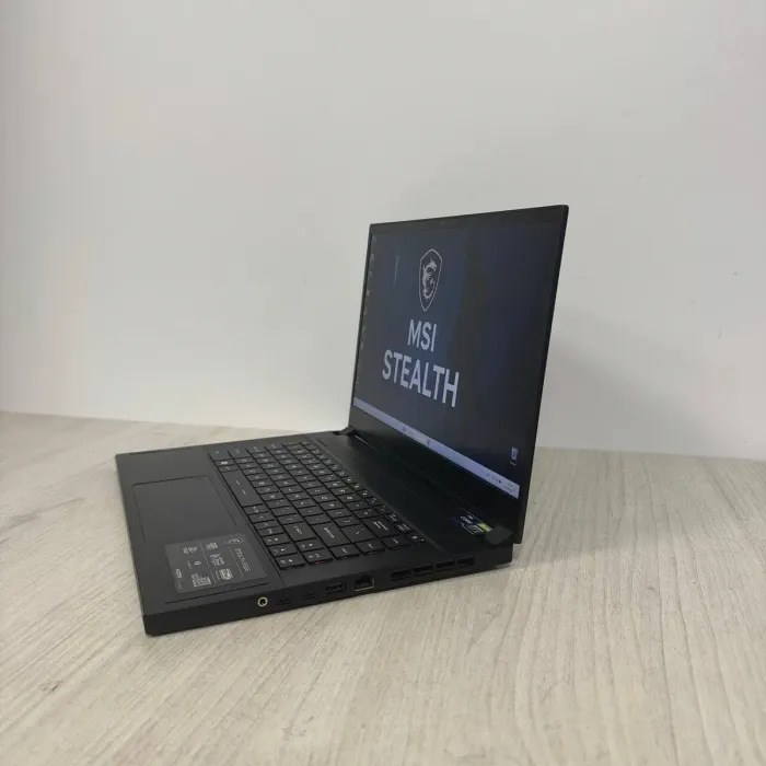 Ігровий ноутбук Б-класу MSI Stealth GS66 12UH / 15.6" (2560x1440) IPS / Intel Core i9-12900H (14 (20) ядер по 3,8 - 5,0 ГГц) / 16 ГБ DDR5 / 512 ГБ SSD / nVidia GeForce RTX 3080, 8 ГБ GDDR6, 256-bit / WebCam б/в - зображення 5