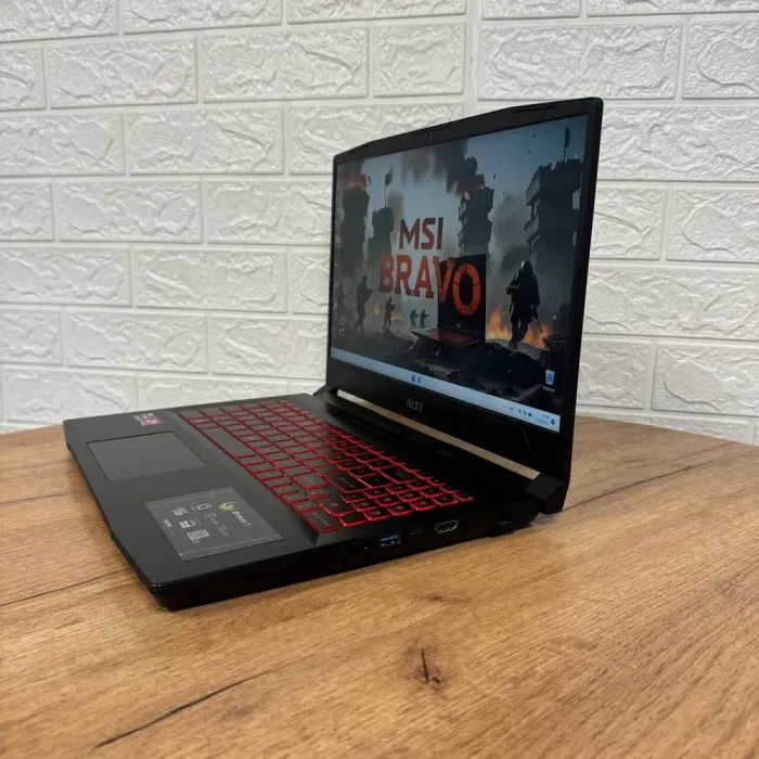 Ігровий ноутбук Б-клас MSI Bravo 15 B5ED / 15.6" (1920x1080) IPS / AMD Ryzen 7 5800H (8 (16) ядер по 3.2 - 4.4 GHz) / 16 GB DDR4 / 512 GB SSD NVMe / AMD Radeon RX 6550M, 4 GB GDDR6, 64-bit / WebCam б/в - зображення 5