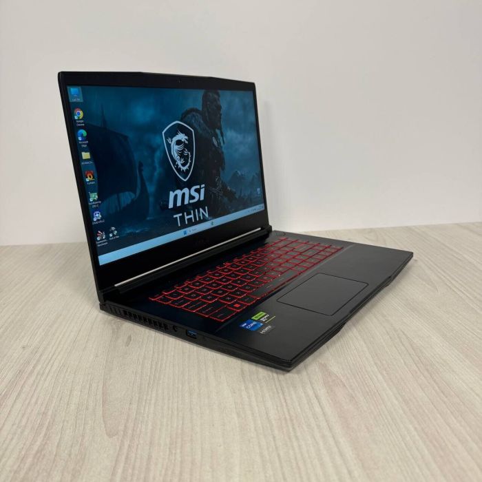 Ігровий ноутбук Б-класу MSI GF63 Thin 11UC / 15.6" (1920x1080) IPS / Intel Core i5-11400H (6 (12) ядер по 2,7 - 4,5 ГГц) / 16 ГБ DDR4 / 512 ГБ SSD NVMe / nVidia GeForce RTX 3050, 4 ГБ GDDR6, 128-bit / WebCam б/в - зображення 4