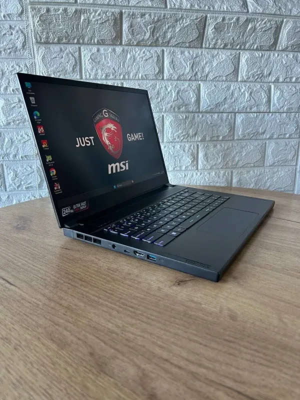 Ігровий ноутбук Б-клас MSI GS66 Stealth 11UE / 15.6" (1920x1080) IPS / Intel Core i7-11800H (8 (16) ядер по 2.3 - 4.6 GHz) / 16 GB DDR4 / 1000 GB SSD / nVidia GeForce RTX 3060, 6 GB GDDR6, 192-bit / WebCam б/в - зображення 4