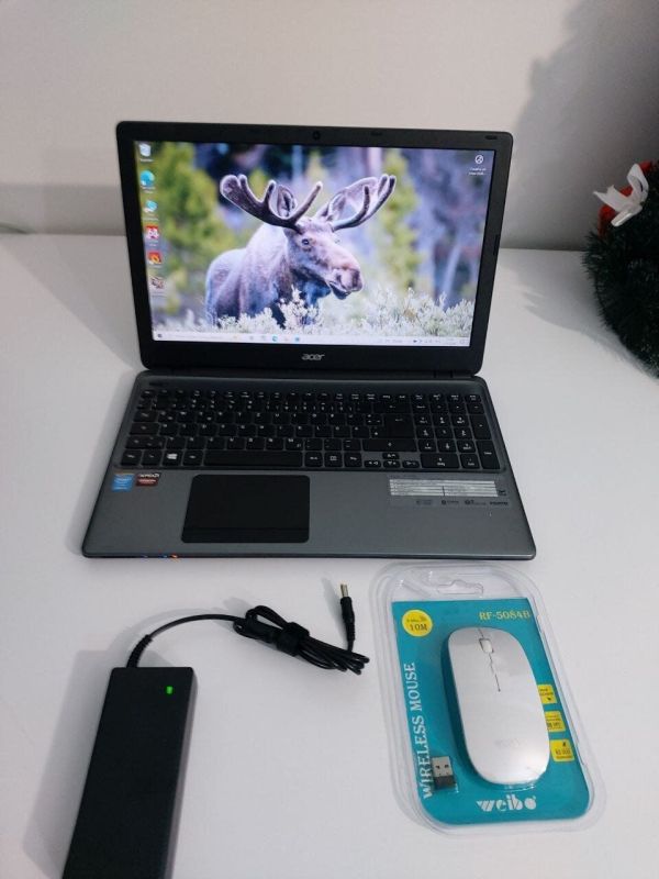 Ноутбук Б-клас Acer Aspire E1-572G / 15.6" (1366x768) TN / Intel Core i5-4200U (2 (4) ядра по 1.6 - 2.6 GHz) / 12 GB DDR3 / 240 GB SSD / AMD Radeon R7 M265, 2 GB GDDR3, 128-bit / WebCam / DVD-ROM б/в - изображение 2