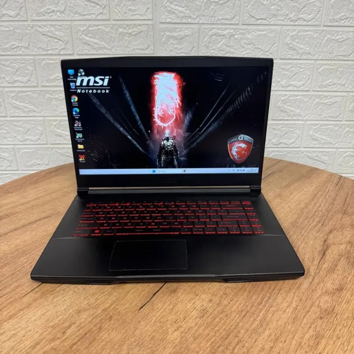Ігровий ноутбук Б-клас MSI GF63 Thin 11SC / 15.6" (1920x1080) IPS / Intel Core i5-11400H (6 (12) ядер по 2.7 - 4.5 GHz) / 8 GB DDR4 / 256 GB SSD / nVidia GeForce GTX 1650 Max-Q, 4 GB GDDR6, 128-bit / WebCam б/в - зображення 2