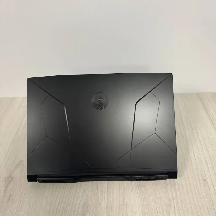 Ігровий ноутбук MSI Bravo 15 C7VFK / 15.6" (1920x1080) IPS / AMD Ryzen 7 7735HS (8 (16) ядер по 3,2 - 4,75 ГГц) / 16 ГБ DDR5 / 512 ГБ SSD NVMe / nVidia GeForce RTX 4060, 8 ГБ GDDR6, 128-bit / WebCam б/в - зображення 3