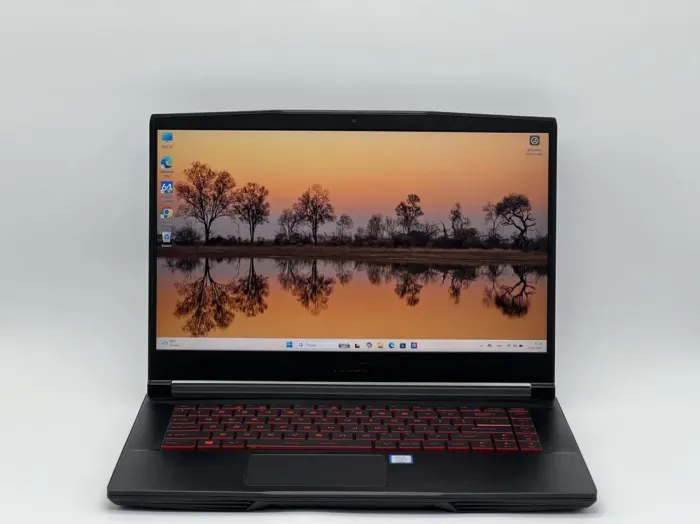 Ігровий ноутбук MSI GF63 8RD / 15.6" (1920x1080) IPS / Intel Core i7-8750H (6 (12) ядер по 2.2 - 4.1 GHz) / 16 GB DDR4 / 480 GB SSD / nVidia GeForce GTX 1050 Ti, 4 GB GDDR5, 128-bit / WebCam б/в - зображення 2