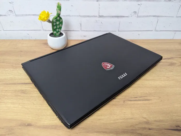 Ігровий ноутбук Б-клас MSI GP62 6QE MS-16J5 / 15.6" (1920x1080) TN / Intel Core i7-6700HQ (4 (8) ядра по 2.6 - 3.5 GHz) / 16 GB DDR4 / 256 GB SSD + 1000 GB HDD / nVidia GeForce GTX 960M, 4 GB GDDR5, 128-bit / WebCam / DVD-ROM б/в - зображення 7