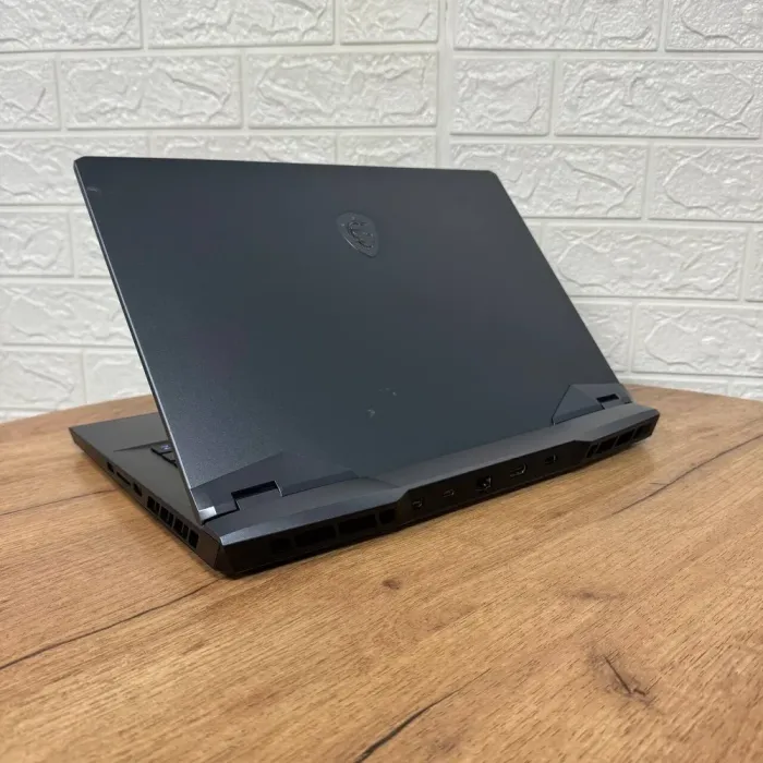 Ігровий ноутбук Б-клас MSI GE66 Raider 10SFS / 15.6" (1920x1080) IPS / Intel Core i7-10750H (6 (12) ядер по 2.6 - 5.0 GHz) / 16 GB DDR4 / 512 GB SSD / nVidia GeForce RTX 2070 Super, 8 GB GDDR6, 256-bit / WebCam б/в - зображення 6