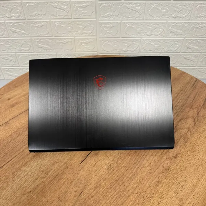 Ігровий ноутбук Б-клас MSI GF75 Thin 10SCSXR / 17.3" (1920x1080) IPS / Intel Core i5-10300H (4 (8) ядра по 2.5 - 4.5 GHz) / 16 GB DDR4 / 512 GB SSD / nVidia GeForce GTX 1650 Ti, 4 GB GDDR6, 128-bit / WebCam б/в - зображення 3