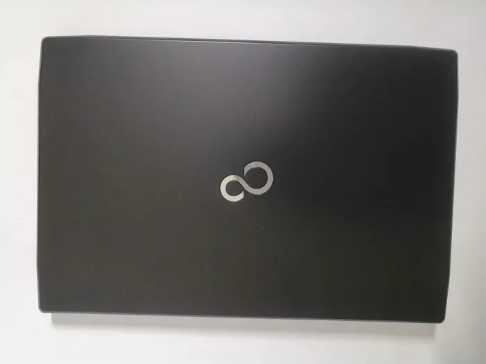 Ноутбук Fujitsu LifeBook A544 / 15.6" (1366x768) TN / Intel Core i3-4005U (2 (4) ядра по 1.7 GHz) / 4 GB DDR3 / 500 GB HDD / Intel HD Graphics 4600 / WebCam / DVD-ROM б/в - зображення 7