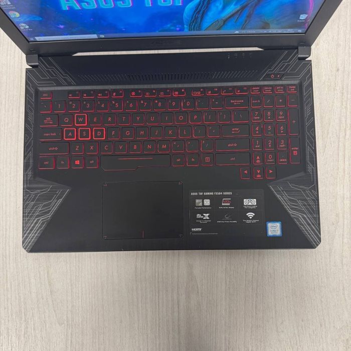Ігровий ноутбук Б-класу Asus TUF Gaming / 17,3" (1920x1080) IPS / Intel Core i7-8750H (6 (12) ядер по 2,2 - 4,1 ГГц) / 8 ГБ DDR4 / 256 ГБ SSD / nVidia GeForce GTX 1060, 3 ГБ GDDR5, 192-біт / Веб-камера / HDMI б/в - зображення 4