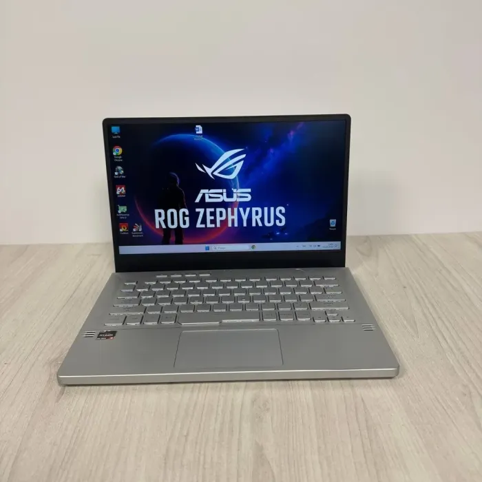 Ігровий ультрабук Б-класу Asus ROG Zephyrus G14 GA401IV / 14" (1920x1080) IPS / AMD Ryzen 9 4900HS (8 (16) ядер по 3.0 - 4.3 GHz) / 16 GB DDR4 / 512 GB SSD NVMe / nVidia GeForce RTX 2060 Max-Q, 6 GB GDDR6, 192-bit б/в - зображення 2