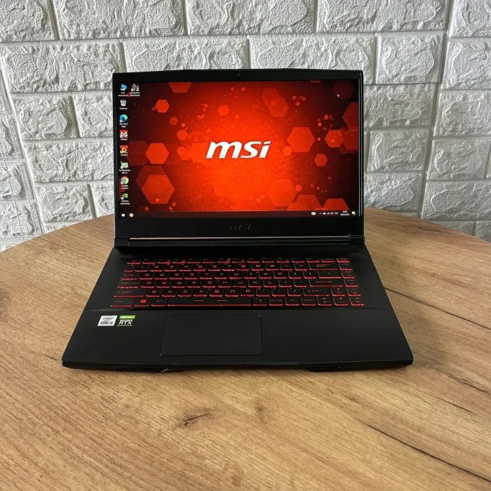 Ігровий ноутбук MSI GF63 Thin 10UD / 15.6" (1920x1080) IPS / Intel Core i5-10500H (6 (12) ядер по 2.5 - 4.5 GHz) / 8 GB DDR4 / 512 GB SSD / nVidia GeForce RTX 3050 Ti, 4 GB GDDR6, 128-bit / WebCam б/в - зображення 2