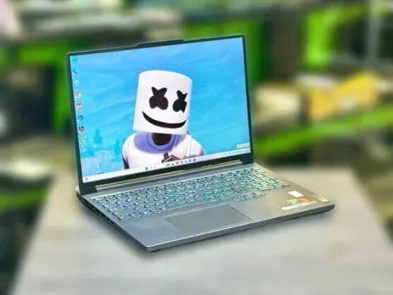 Ігровий ноутбук Lenovo Legion Slim 5 16APH8 / 16" (2560x1600) IPS / AMD Ryzen 7 7840HS (8 (16) ядер по 3.8 - 5.1 GHz) / 16 GB DDR5 / 512 GB SSD M.2 / nVidia GeForce RTX 4060, 8 GB GDDR6, 128-bit / WebCam / Win 11 Home б/в - зображення 3