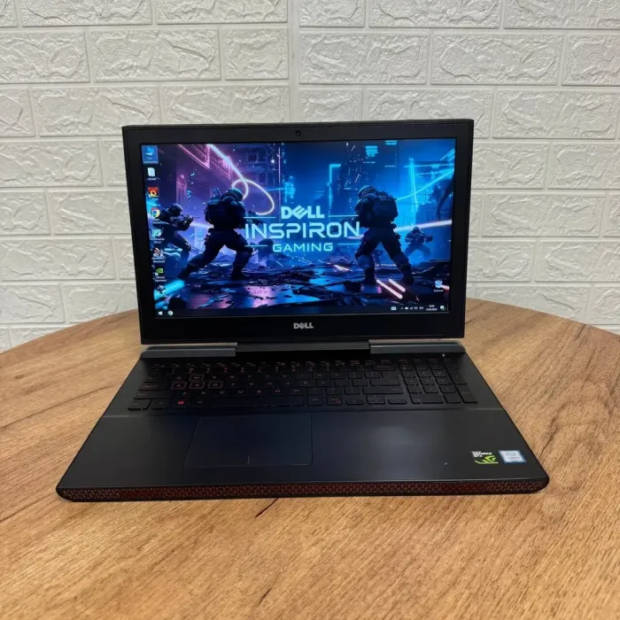 Ігровий ноутбук Б-класу Dell Inspiron 15 Gaming 7567 / 15.6" (1920x1080) IPS / Intel Core i5-7300HQ (4 ядра по 2,5 - 3,5 ГГц) / 16 ГБ DDR4 / 128 ГБ SSD M.2 + 1000 ГБ HDD / nVidia GeForce GTX 1050, 4 ГБ GDDR5, 128-bit / WebCam б/в - зображення 2