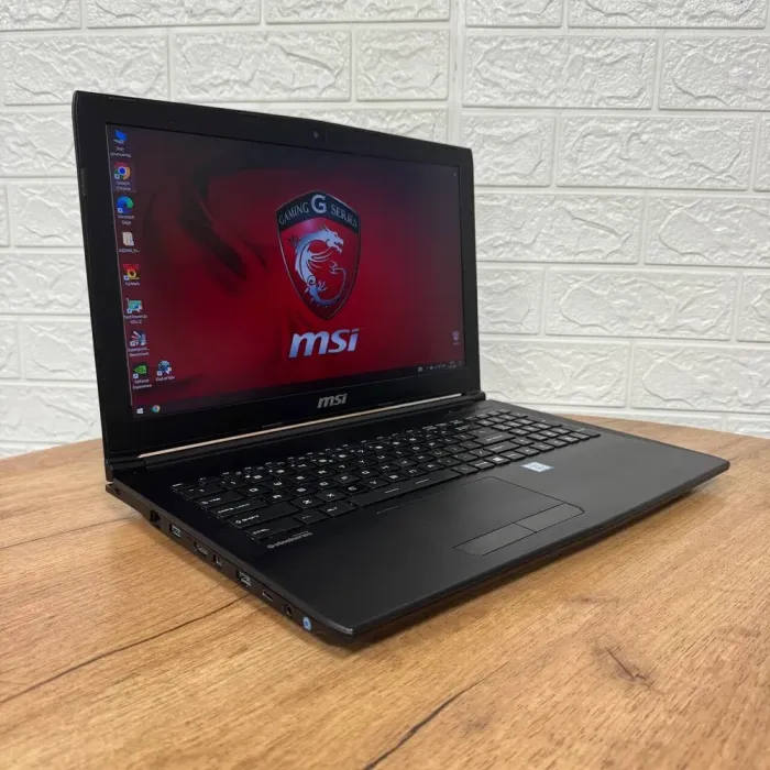 Ігровий ноутбук Б-клас MSI GL62M 7REX / 15.6" (1920x1080) TN / Intel Core i7-7700HQ (4 (8) ядра по 2.8 - 3.8 GHz) / 16 GB DDR4 / 256 GB SSD M.2 + 1000 GB HDD / nVidia GeForce GTX 1050 Ti, 4 GB GDDR5, 128-bit / WebCam б/в - зображення 4