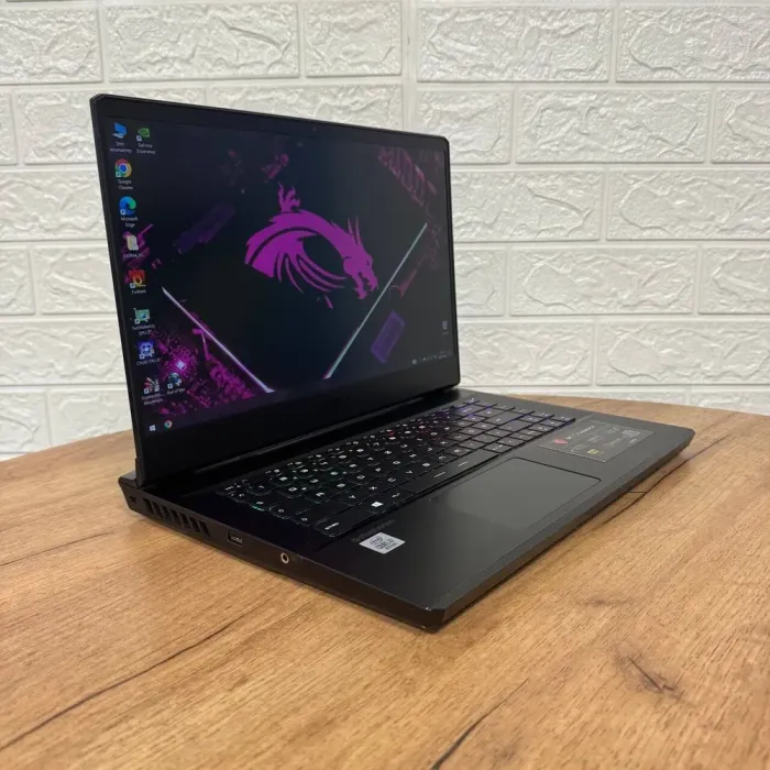 Ігровий ноутбук Б-клас MSI GP66 Leopard 10UG / 15.6" (1920x1080) IPS / Intel Core i7-10750H (6 (12) ядер по 2.6 - 5.0 GHz) / 16 GB DDR4 / 512 GB SSD NVMe / nVidia GeForce RTX 3070, 8 GB GDDR6, 256-bit / WebCam б/в - зображення 4