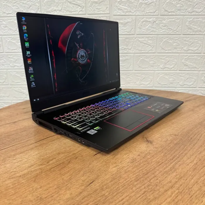 Ігровий ноутбук Б-клас MSI GE75 Raider 10SE / 17.3" (1920x1080) IPS / Intel Core i7-10750H (6 (12) ядер по 2.6 - 5.0 GHz) / 16 GB DDR4 / 512 GB SSD / nVidia GeForce RTX 2060, 6 GB GDDR6, 192-bit / WebCam б/в - зображення 4