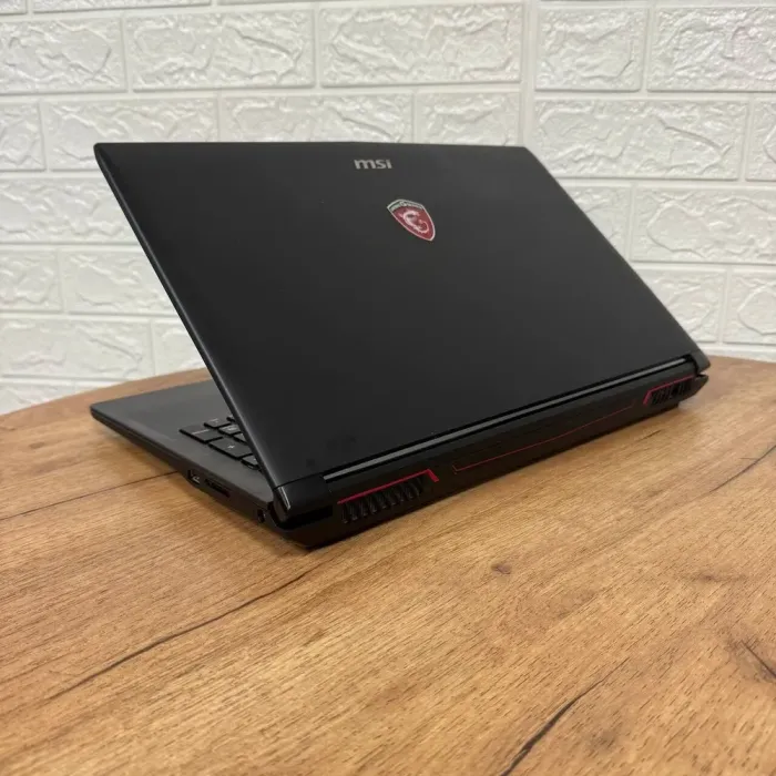 Ігровий ноутбук Б-клас MSI GL62M 7REX / 15.6" (1920x1080) TN / Intel Core i7-7700HQ (4 (8) ядра по 2.8 - 3.8 GHz) / 16 GB DDR4 / 256 GB SSD M.2 + 1000 GB HDD / nVidia GeForce GTX 1050 Ti, 4 GB GDDR5, 128-bit / WebCam б/в - зображення 6