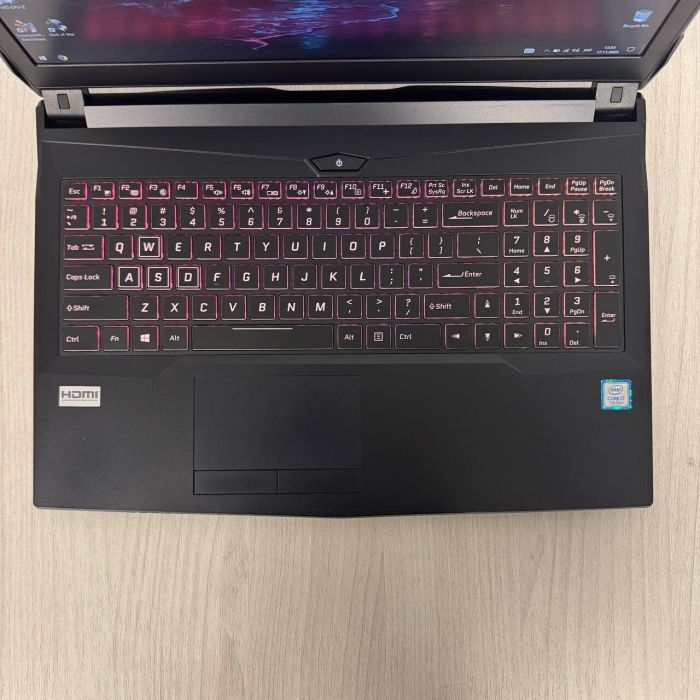 Ігровий ноутбук Б-класу Clevo N850Hj / 15,6" (1920x1080) IPS / Intel Core i7-7700HQ (4 (8) ядра по 2,8 - 3,8 ГГц) / 8 ГБ DDR4 / 128 ГБ SSD + 500 ГБ HDD / nVidia GeForce GTX 1050, 2 ГБ GDDR5, 128-біт / WebCam б/в - зображення 4