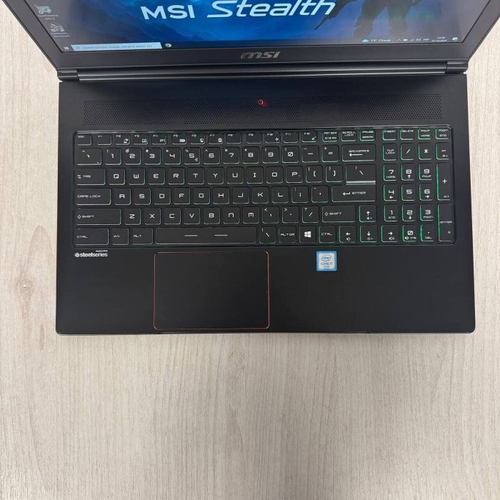 Ігровий ноутбук Б-класу MSI GS63VR Stealth 6RF / 15.6" (1920x1080) IPS / Intel Core i7-6700HQ (4 (8) ядра по 2.6 - 3.5 GHz) / 16 GB DDR4 / 512 GB SSD / nVidia GeForce GTX 1060, 6 GB GDDR5, 192-bit / WebCam б/в - зображення 3